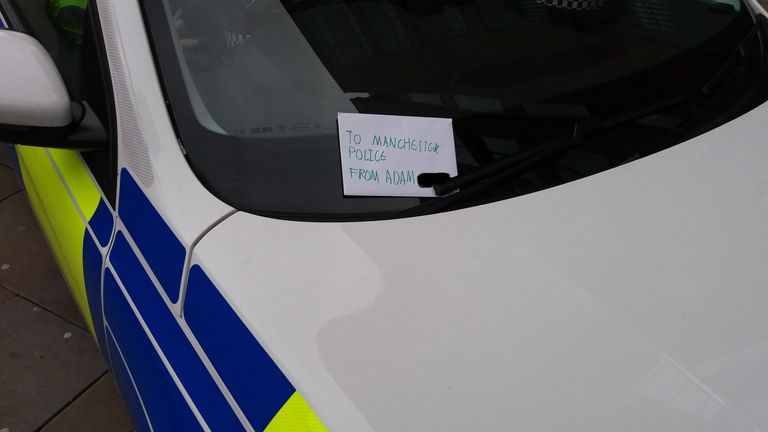 The note thanks officers for 'keeping us safe and saving our lives'. Pic: @GMPCityCentre