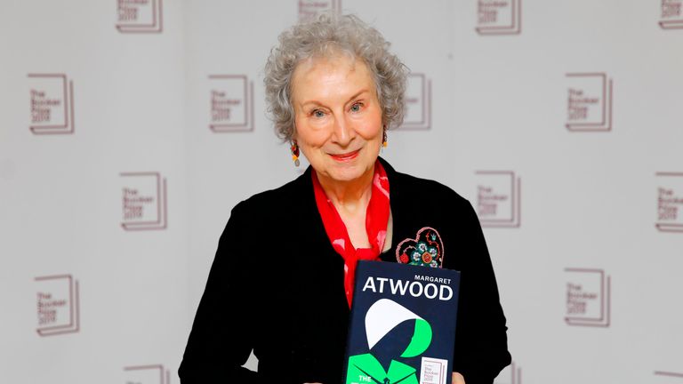 Canadian author Margaret Atwood poses with her book The Testaments during the photo call for the authors shortlisted for the 2019 Booker Prize for Fiction