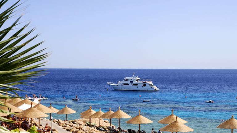 Tourists sunbathe at the Red Sea resort of Sharm el Sheikh
