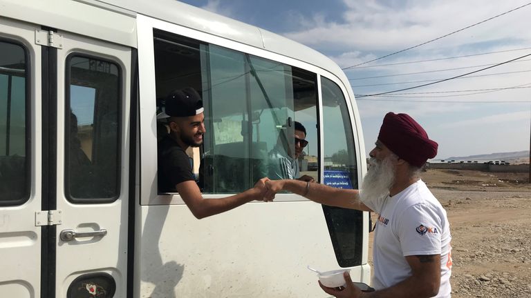 The refugees are taken from the border to the camp in Iraq by bus. Pic: Helan Fahmi, Khalsa Aid International
