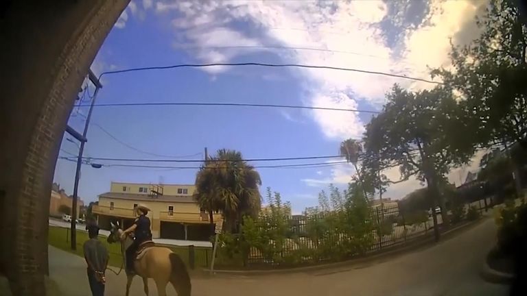 A white Texas police officer could be heard twice on a body camera video saying that leading a homeless black man by a rope down city streets while he and his partner were on horseback would look “bad”