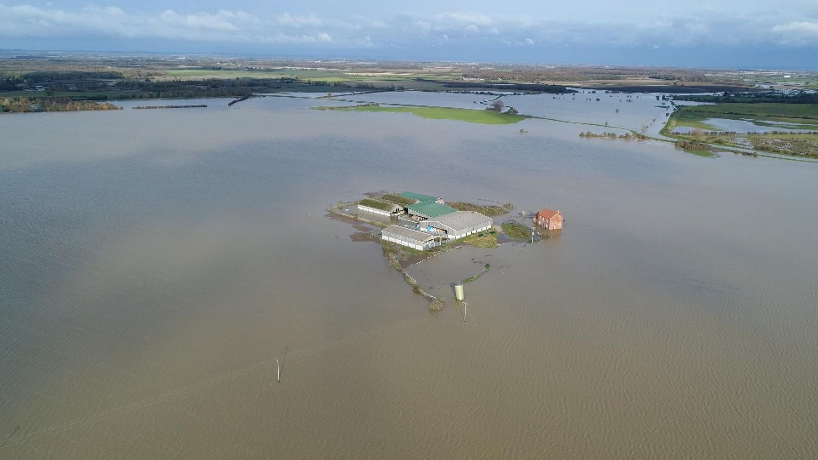 Floods: Drone Shows Farm Encircled By Flood Water | UK News | Sky News