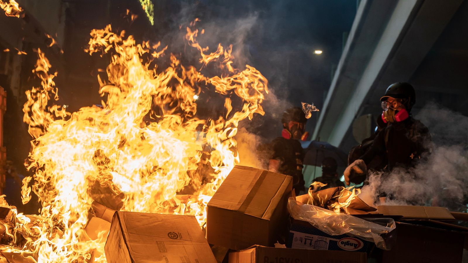 Student dies after fall from car park during Hong Kong tear gas raid