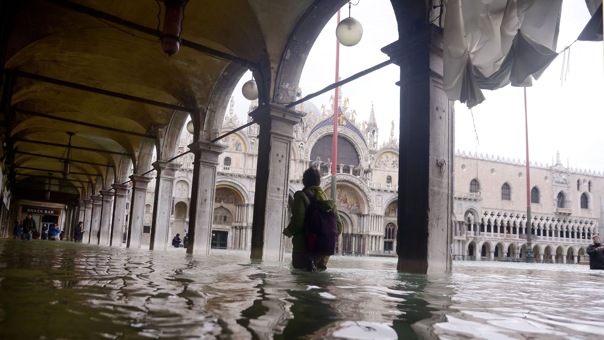 Venice floods St Mark's Square reopens a day after being submerged