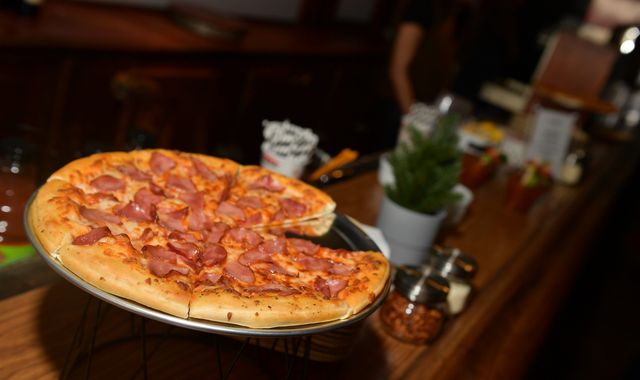 Daughter saves mum from domestic violence by pretending to order pizza