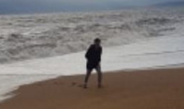 Photo of 'hero' son taken moments before he was swept out to sea while saving mum's life