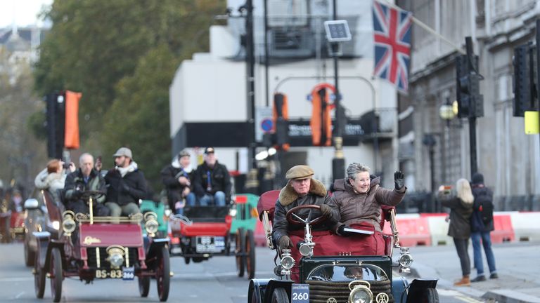 Participants driving their vehicles past the Houses of Parliament, London, during the Bonhams London to Brighton Veteran Car Run.