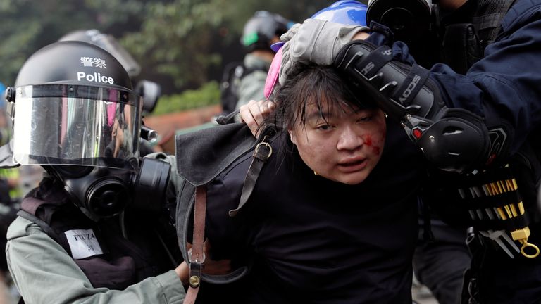 Police detain protesters who attempt to leave the campus of Hong Kong Polytechnic University (PolyU) during clashes with police in Hong Kong, China November 18, 2019. REUTERS/Tyrone Siu