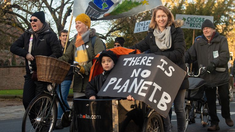 People take part in the YouthStrike4Climate march in Cambridge.