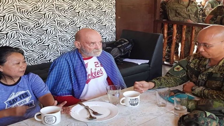 Allan Hyrons and his wife Wilma pictured after their rescue. Pic: Armed Forces of the Philippines