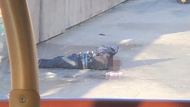 This picture of the alleged attacker appears to show the hoax explosive device
