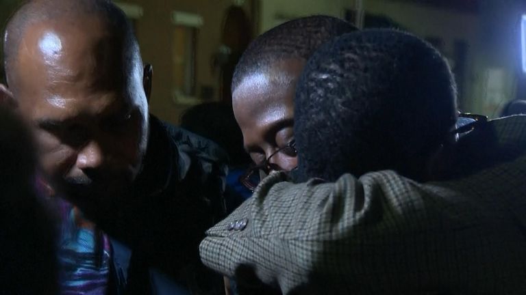 Alfred Chestnut is embraced after his release