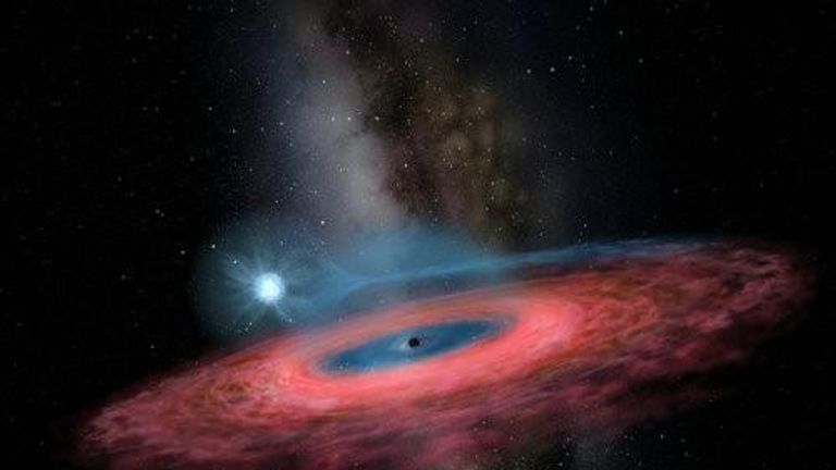 An artist impression of the giant black hole. Pic: YU Jingchuan, Beijing Planetarium