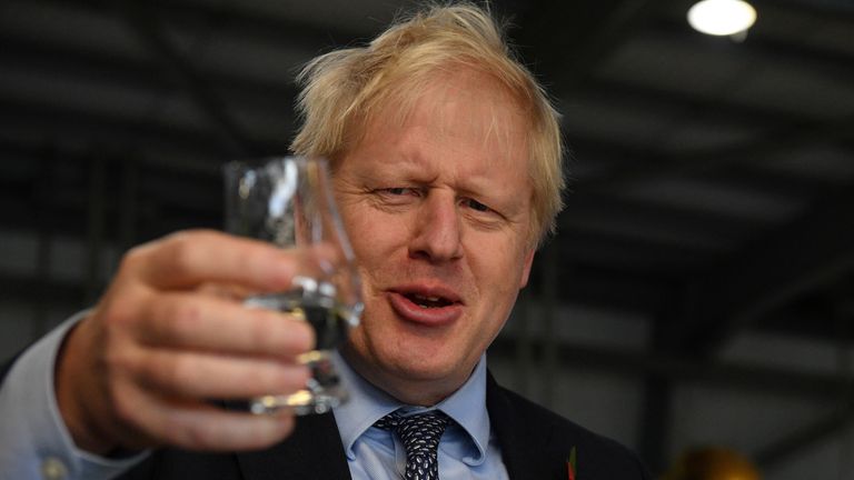 Boris Johnson tastes whisky during a general election campaign visit to Diageo&#39;s Roseisle Distillery near Elgin, Scotland