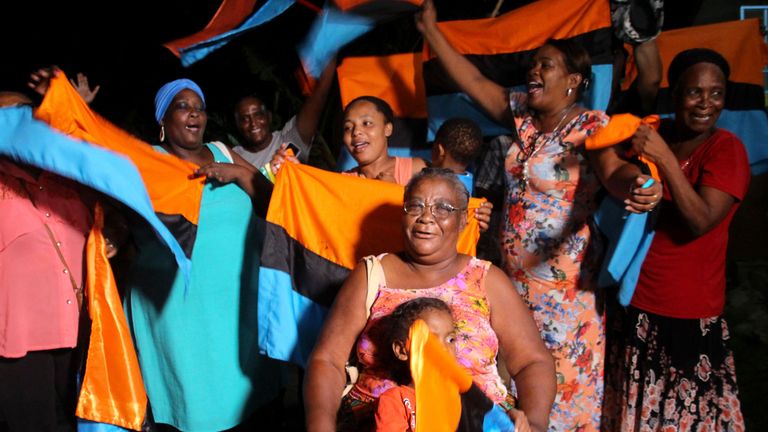 Chagossians celebrate after the United Nations ordered Britain to give up control of the islands in February