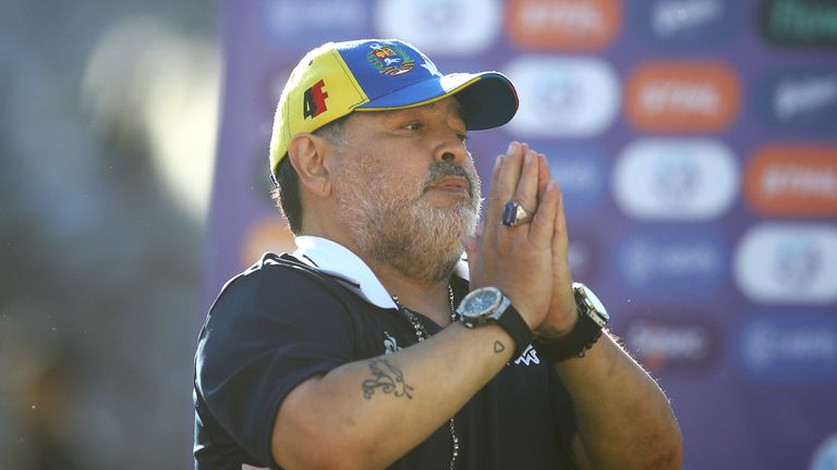 Diego Maradona gestures to the supporters after a match between his current side Gimanisia La Plata and Estudiantes earlier this month