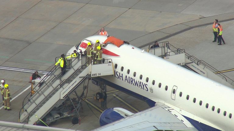 A protester climbed on top of a British Airways plane at City Airport in October