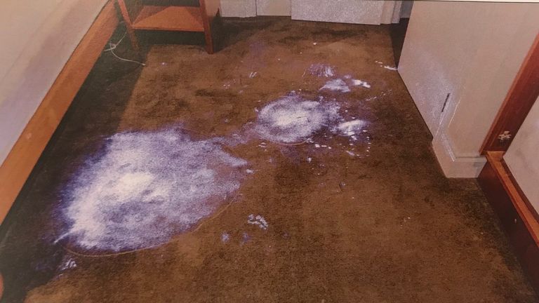 Police used luminol to show traces of blood on the carpet