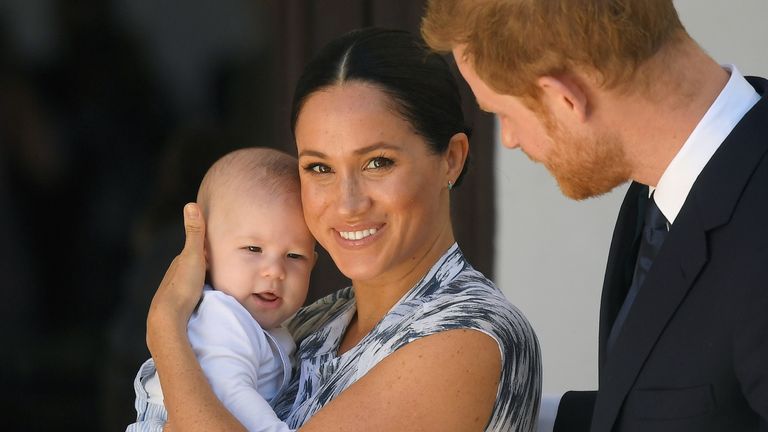 Harry and Meghan with baby son Archie in South Africa earlier this year 