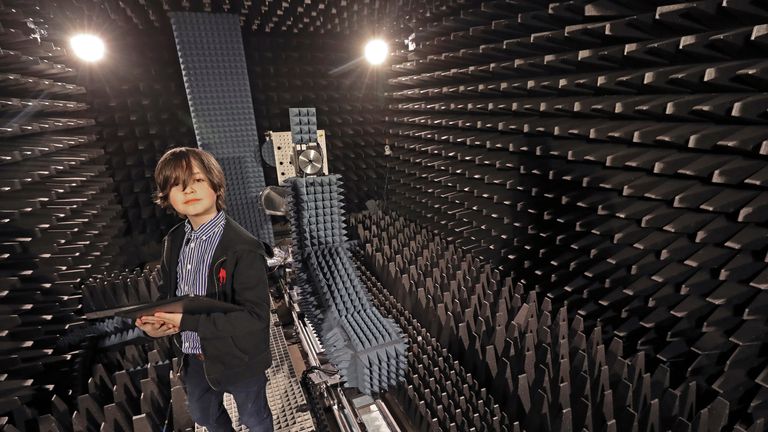 Laurent Simons poses in a laboratory at the University of Technology