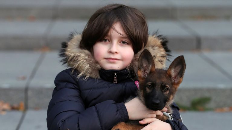 Laurent with his nine-week-old puppy Sammy