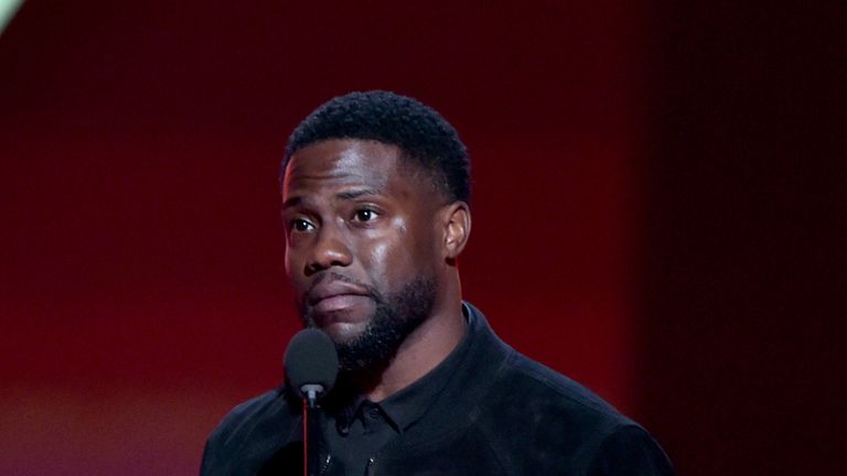 Kevin Hart accepts The Comedy Act of 2019 award on stage for 'Kevin Hart: Irresponsible' on stage during the 2019 E! People's Choice Awards. Pic: E! Entertainment