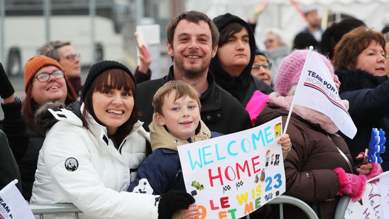 HMS Prince of Wales was welcomed to Portsmouth by hundreds of people gathered along the shoreline