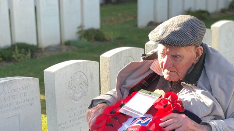Mr Freer visits his father's grave to lay a wreath