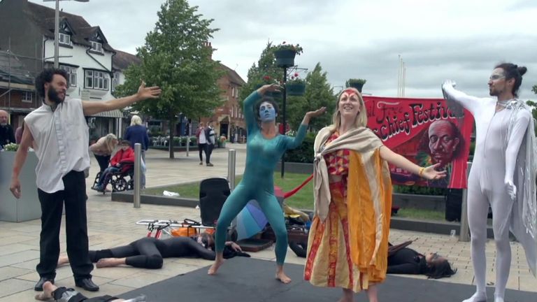 Climate change protesters demonstrating outside the RSC building in Stratford-upon-Avon