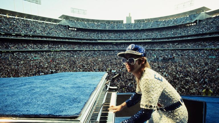 Elton John performing at Dodger Stadium in Los Angeles in 1975. Pic: Terry O&#39;Neill/Iconic Images