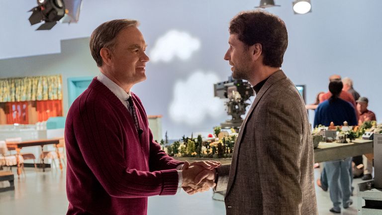 Mister Rogers (Tom Hanks) meets journalist Lloyd Vogel (Matthew Rhys) in TriStar Pictures... A BEAUTIFUL DAY IN THE NEIGHBORHOOD.