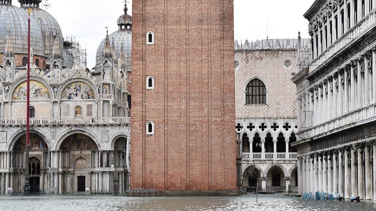 A view of the flooded St. Mark&#39;s Square, as high tide reaches peak, in Venice