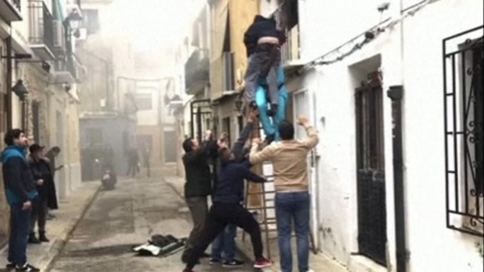 Migrant rescues disabled man from house fire in Spain | World News ...