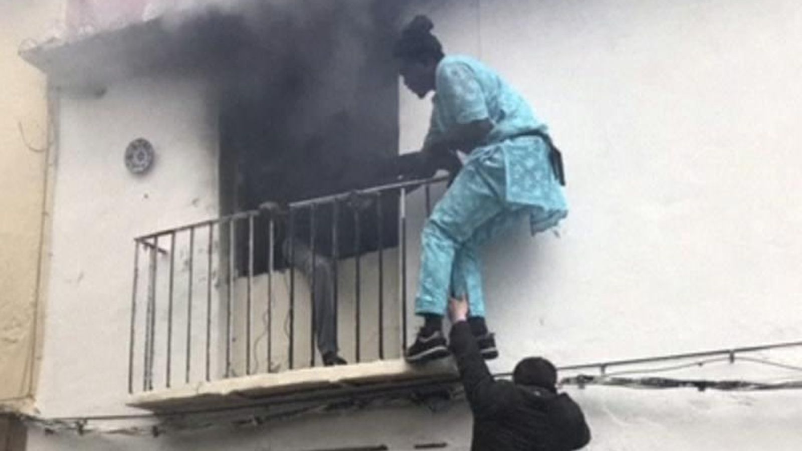 Migrant rescues disabled man from house fire in Spain | World News ...