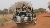 Soldiers from Burkina Faso patrol on the road of Gorgadji in sahel area, Burkina Faso March 3, 2019. Picture taken March 3, 2019. REUTERS/Luc Gnago