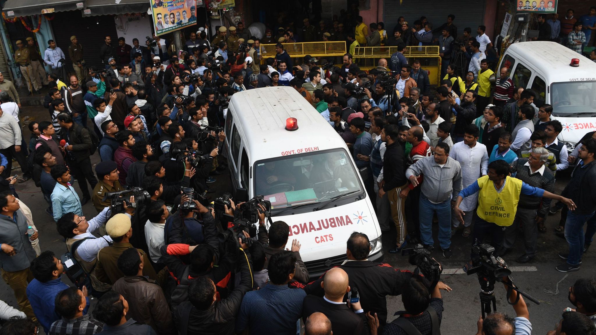 New Delhi Factory Fire Relatives Identify Victims From Photos On Police Phones As Blaze Kills 