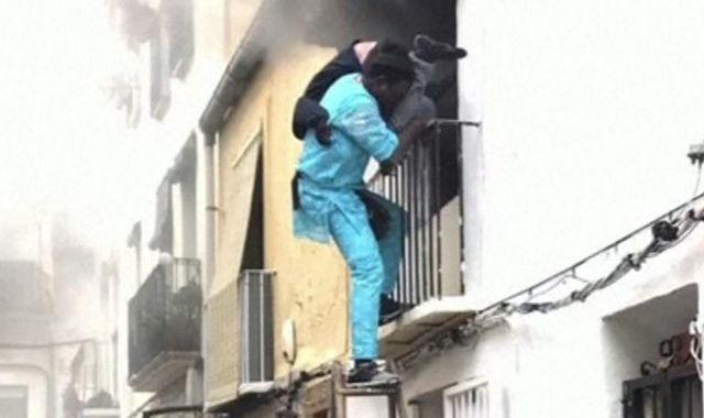 Migrant rescues disabled man from house fire in Spain