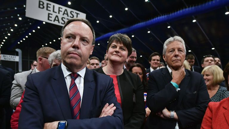 BELFAST, NORTHERN IRELAND - JUNE 09: DUP leader Arlene Foster (2nd L), DUP deputy leader and north Belfast candidate Nigel Dodds (L), former DUP leader and Northern Ireland First Minister Peter Robinson (R) watch on during the Belfast count centre on June 9, 2017 in Belfast, Northern Ireland. After a snap election was called the United Kingdom went to the polls yesterday, after a closely fought election the results from across the country are being counted and an overall result is expected in the early hours. (Photo by Charles McQuillan/Getty Images)