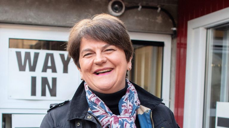 Northern Ireland's Democratic Unionist Party (DUP) leader Arlene Foster wears a Union flag-themed scarff as she arrives at a Polling Station to cast her ballot paper and vote in Brookeborough, Northern Ireland, on December 12, 2019, as Britain holds a general election. (Photo by Paul Faith / AFP) (Photo by PAUL FAITH/AFP via Getty Images)