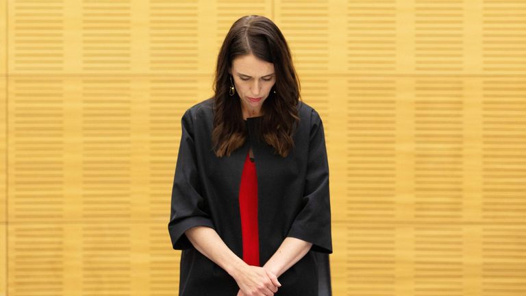 New Zealand Prime Minister Jacinda Ardern stands with her cabinet as they observe a minute's silence in respect for victims of the December 9 White Island volcanic eruption, at Parliament in Wellington on December 16, 2019. - The names of four more people killed in an eruption on New Zealand's most active volcano were released on December 16, as the South Pacific nation paused for a minute's silence at 2:11pm (0111 GMT) -- precisely a week since the eruption -- in tribute to those affected. (Photo by Hagen Hopkins / POOL / AFP) (Photo by HAGEN HOPKINS/POOL/AFP via Getty Images)