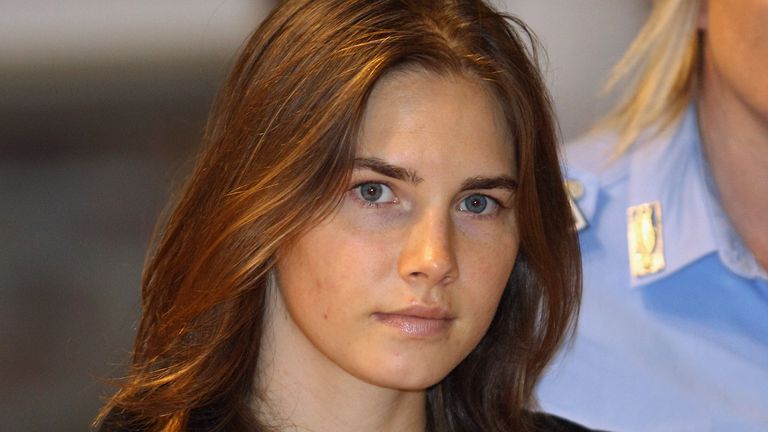 PERUGIA, ITALY - SEPTEMBER 29:  Amanda Knox is escorted to her appeal hearing at Perugia&#39;s Court of Appeal on September 29, 2011 in Perugia, Italy. Amanda Knox and Raffaele Sollecito are awaiting the verdict of their appeal that could see their conviction for the murder of Meredith Kercher overturned. American student Amanda Knox and her Italian ex-boyfriend Raffaele Sollecito, who were convicted in 2009 of killing their British roommate Meredith Kercher in Perugia, Italy in 2007, have served nearly four years in jail after being sentenced to 26 and 25 years respectively.  (Photo by Oli Scarff/Getty Images)