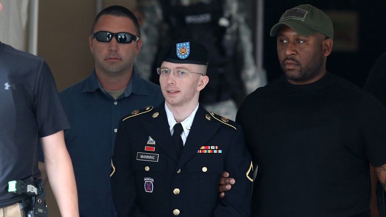 FORT MEADE, MD - JULY 30: U.S. Army Private First Class Bradley Manning is escorted by military police as he leaves his military trial after he was found guilty of 20 out of 21 charges, July 30, 2013 Fort George G. Meade, Maryland. Manning, was found not guilty of aiding the enemy, was convicted of wrongfully causing intelligence to be published on the internet, is accused of sending hundreds of thousands of classified Iraq and Afghanistan war logs and more than 250,000 diplomatic cables to the website WikiLeaks while he was working as an intelligence analyst in Baghdad in 2009 and 2010.  (Photo by Mark Wilson/Getty Images)