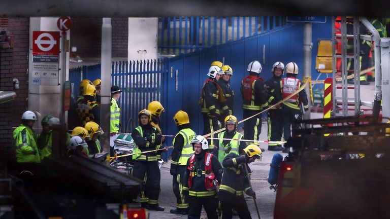 LONDON, UNITED KINGDOM - JANUARY 16:  Emergency services at the scene after a helicopter reportedly collided with a crane attached to St Georges Wharf Tower in Vauxhall, on January 16, 2013 in London, England. According to reports, the helicopter hit the crane before plunging into the road below during the morning rush hour.  (Photo by Dan Kitwood/Getty Images)