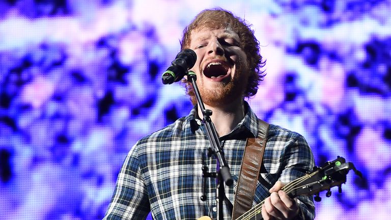 Ed Sheeran performs onstage at the Rock in Rio USA music festival at the MGM Resorts Festival Grounds in Las Vegas, Nevada on May 15, 2015.  AFP PHOTO / ROBYN BECK        (Photo credit should read ROBYN BECK/AFP via Getty Images)