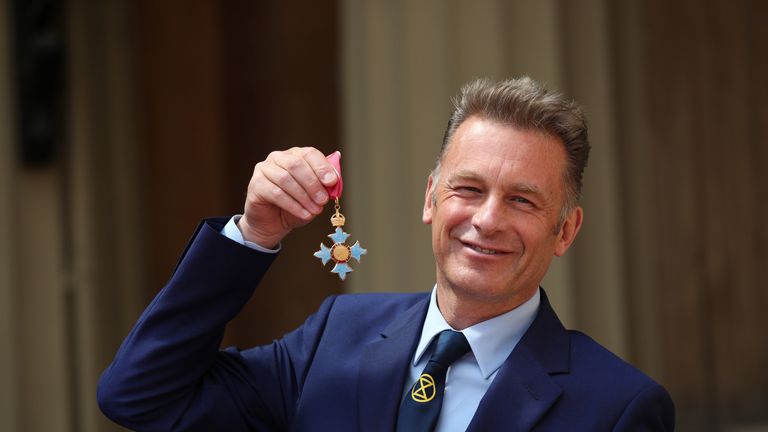 LONDON, ENGLAND - MAY 16: Chris Packham poses with his CBE following an investiture ceremony at Buckingham Palace on May 16, 2019 in London, England. (Photo by Yui Mok - WPA Pool/Getty Images)