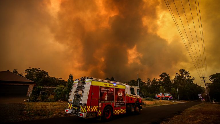 A bushfire approaches homes in the state of New South Wales