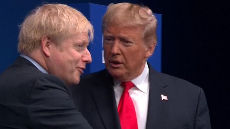 Boris Johnson shakes hands with Donald Trump after waiting around for six minutes on stage for him to arrive