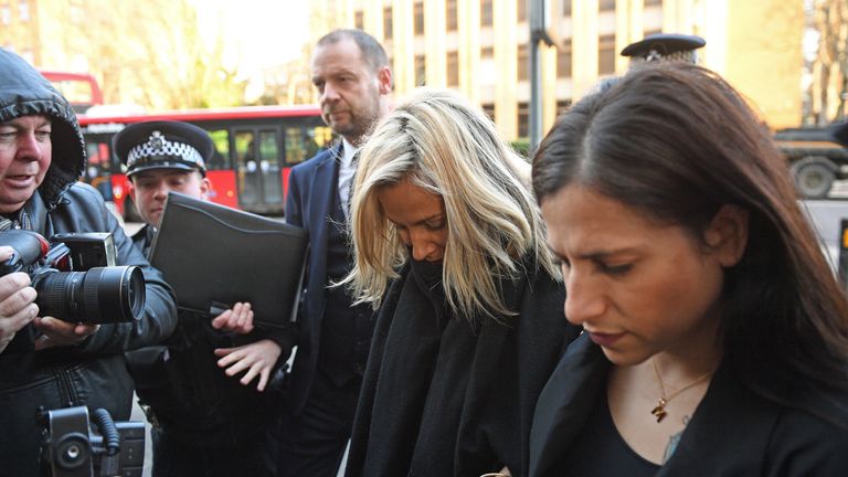 Caroline Flack was mobbed by photographers as she arrived at court 