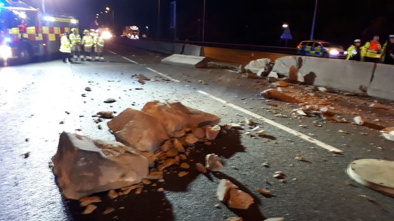 Crane overturned and crashed over both sides of the carriageway of the M25 at Junction 27 with the M11