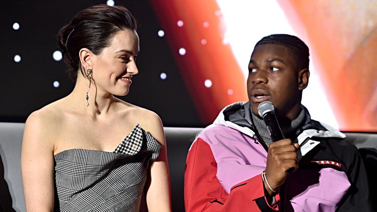 Daisy Ridley and John Boyega at the global press conference for "Star Wars: The Rise of Skywalker"